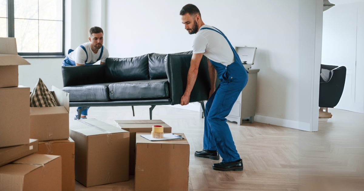 local movers carrying a sofa for relocation
